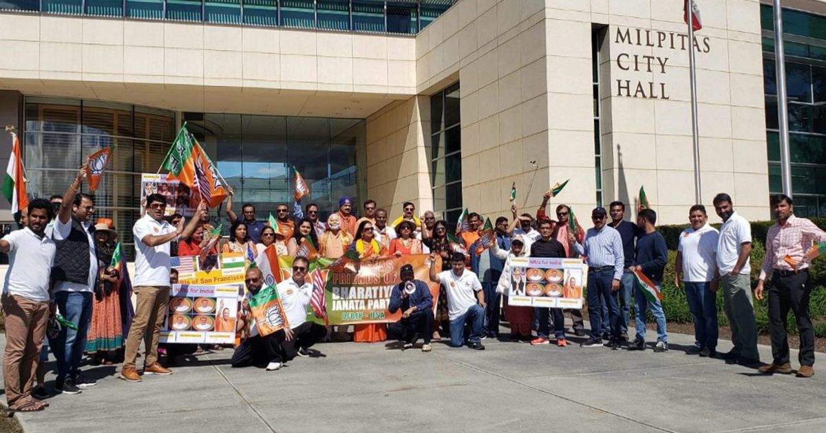 Members and supporters of the Overseas Friends of BJP take part in a rally in support of Indian prime minister Narendra Modi and his BJP