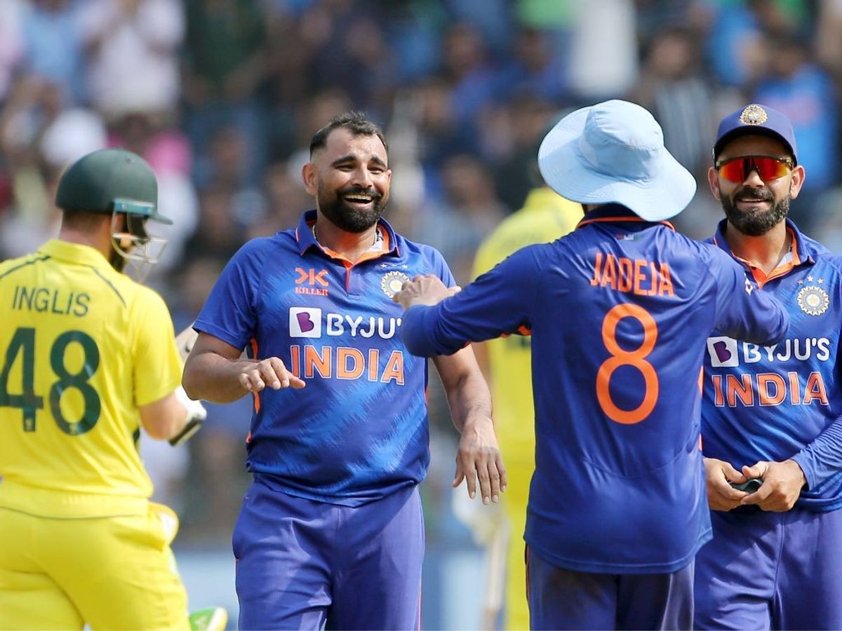 Mohammed Shami celebrate with team mates after picking an Australia wicket in Mumbai on March 17, 2023