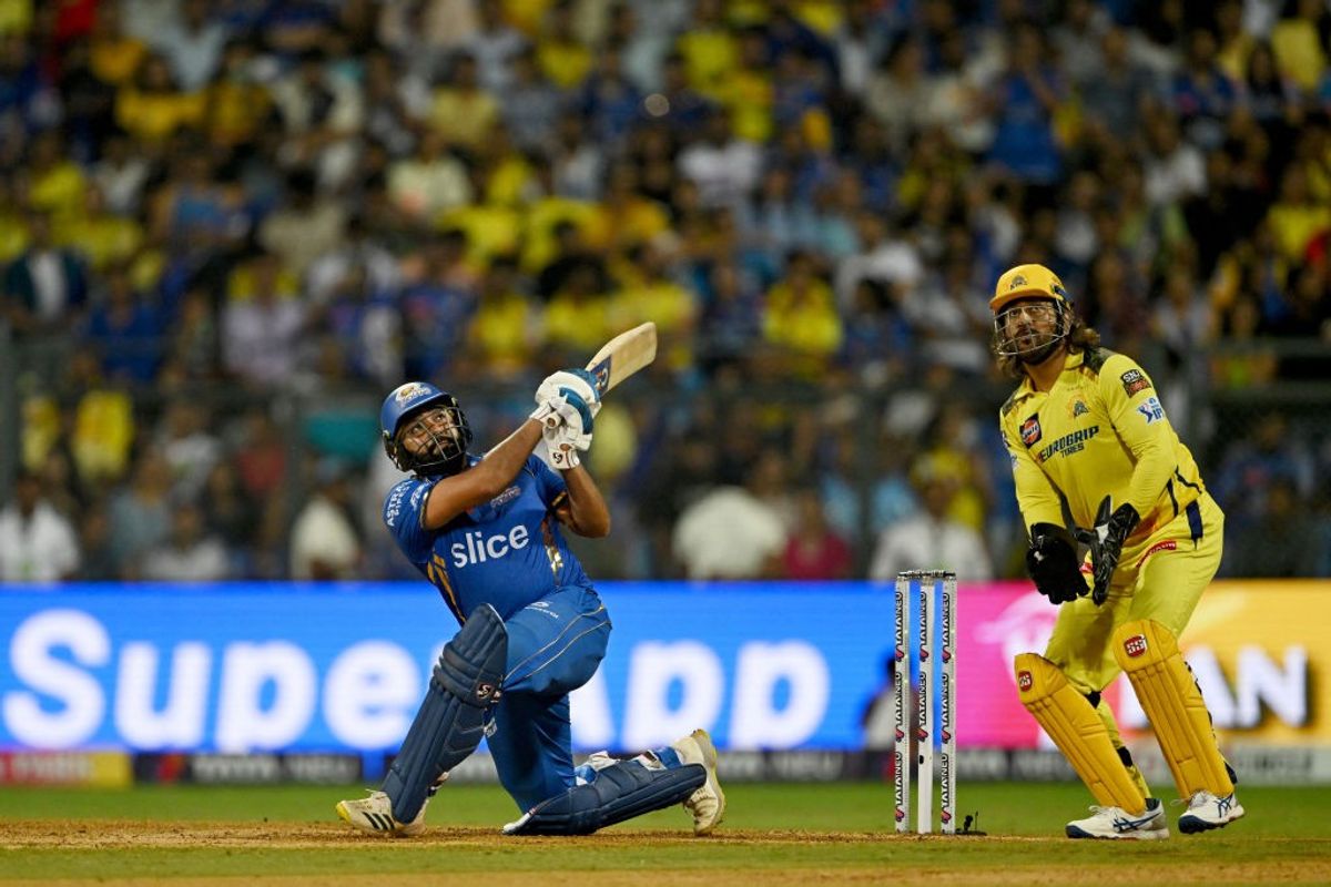 Mumbai Indians' Rohit Sharma scores a shot against Chennai Super Kings in IPL 2024