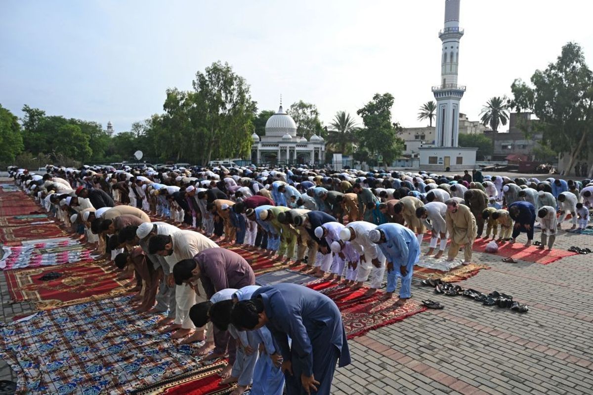 Muslim devotees offer their Eid al-Adha prayers in Rawalpindi in Pakistan.