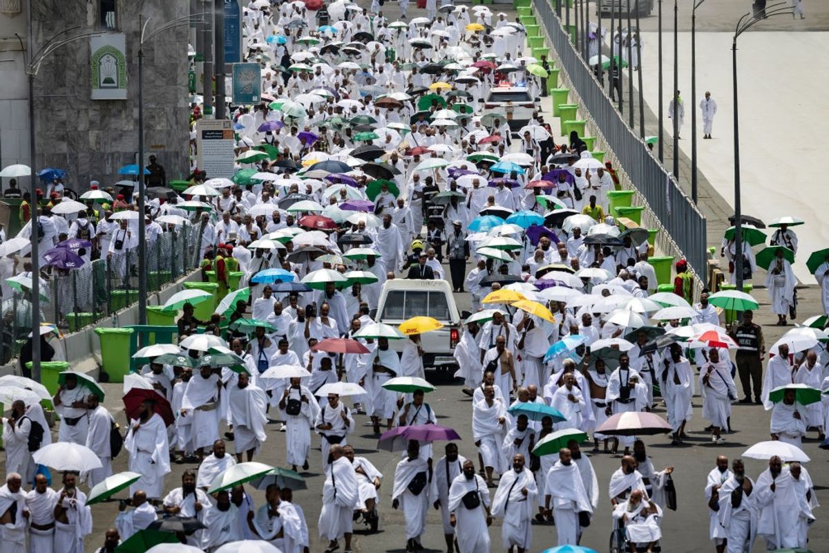 Muslim pilgrims arrive at the Mina tent camp during the annual hajj pilgrimage near the holy city of Mecca in Saudi Arabia