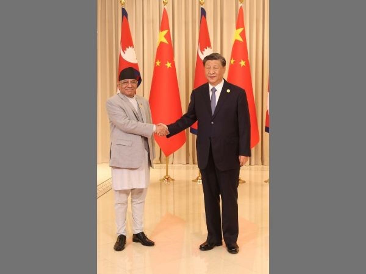 Nepali prime minister Prachanda (L) with Chinese president Xi Jinping during the former's visit to China