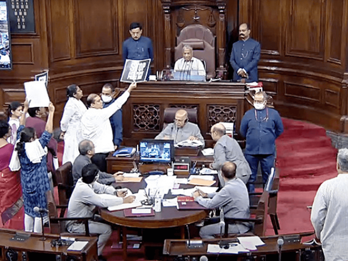 Opposition parliamentarians protest in the Rajya Sabha of the Indian parliament