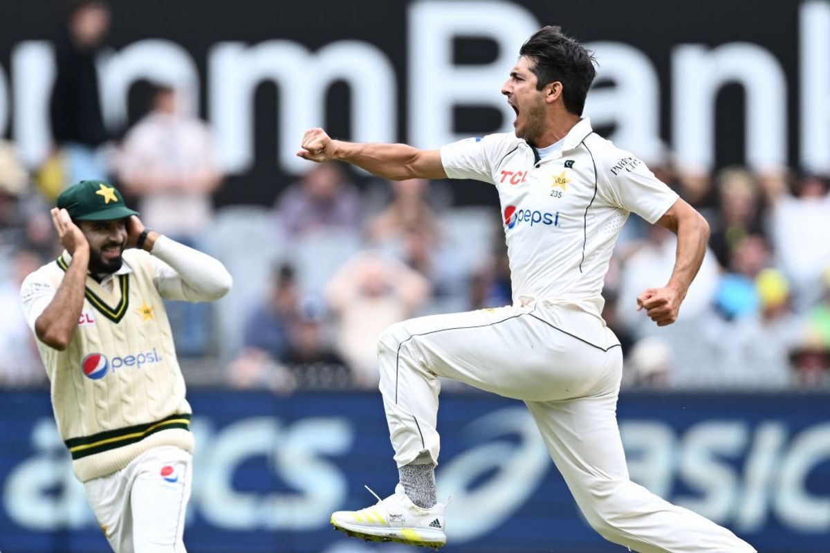 Pakistan bowler Mir Hamza celebrates after dismissing Australia batter Travis Head