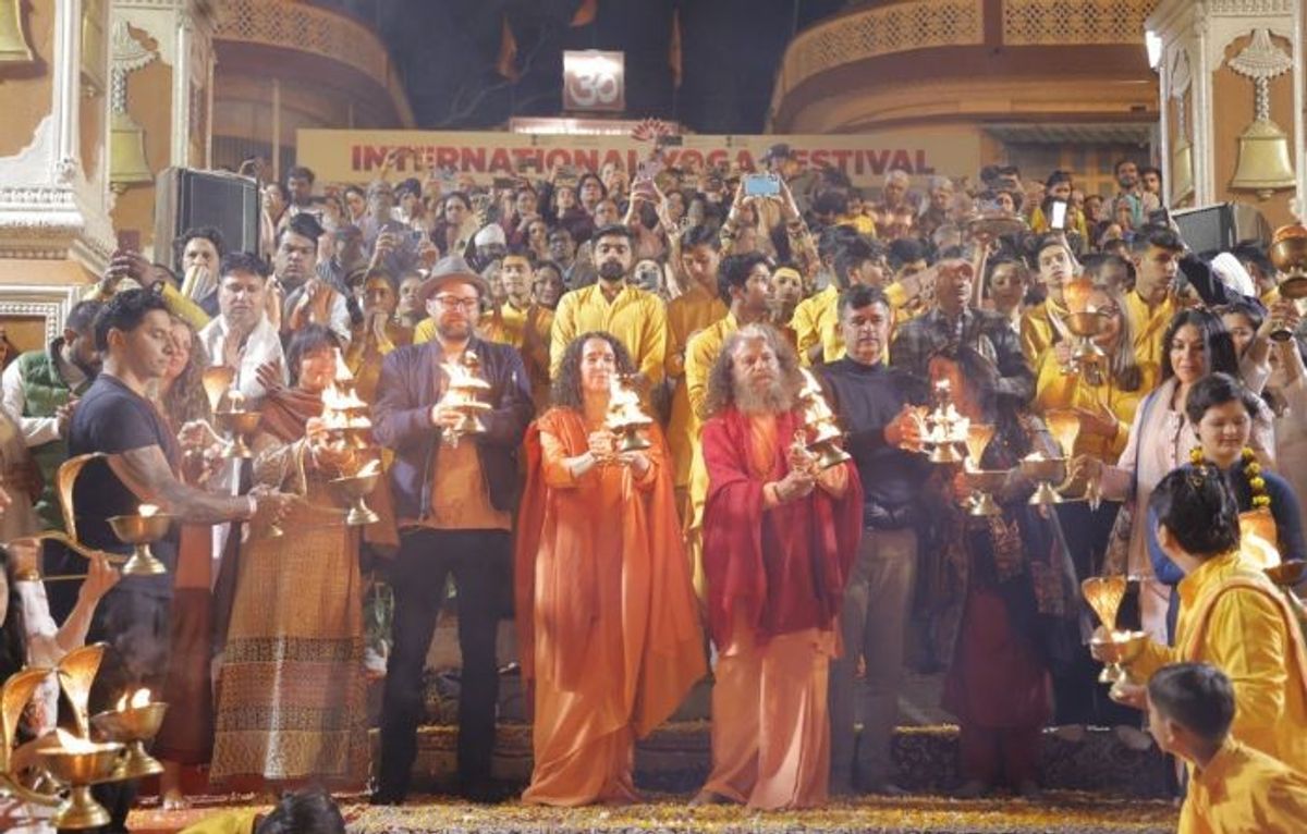 Participants of the International Yoga Festival 2024 at Parmarth Niketan Ashram in the north Indian state of Uttarakhand
