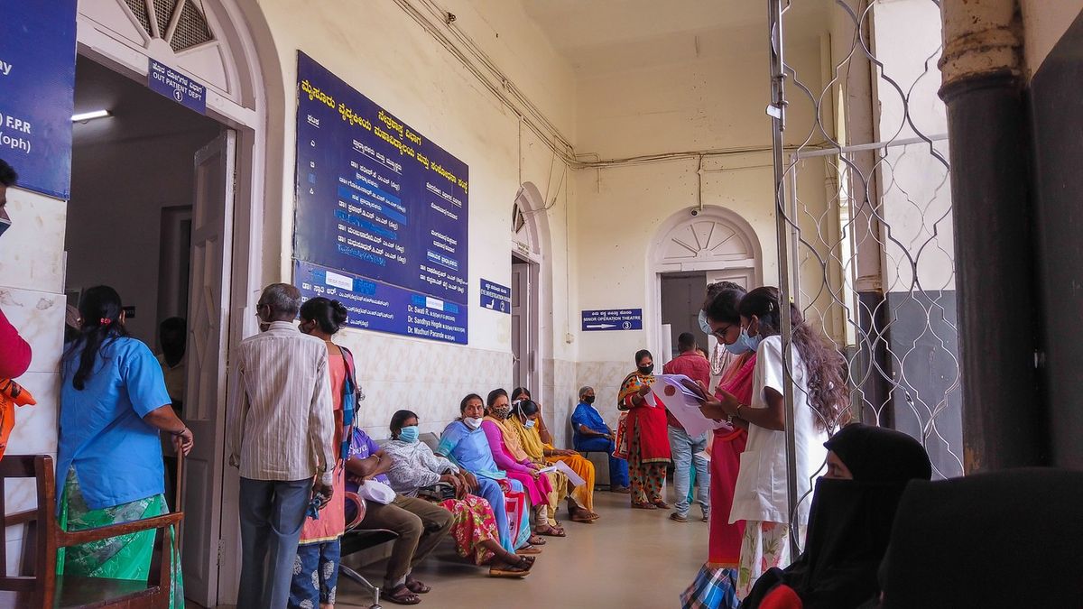 Patients wait at an Indian government