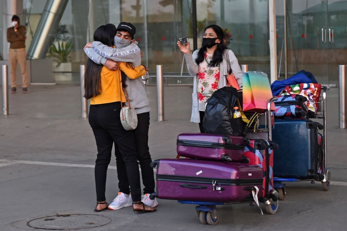 Long waits, confusion at Indian airports as the country tries to stop the spread of ‘mutant’ coronavirus
