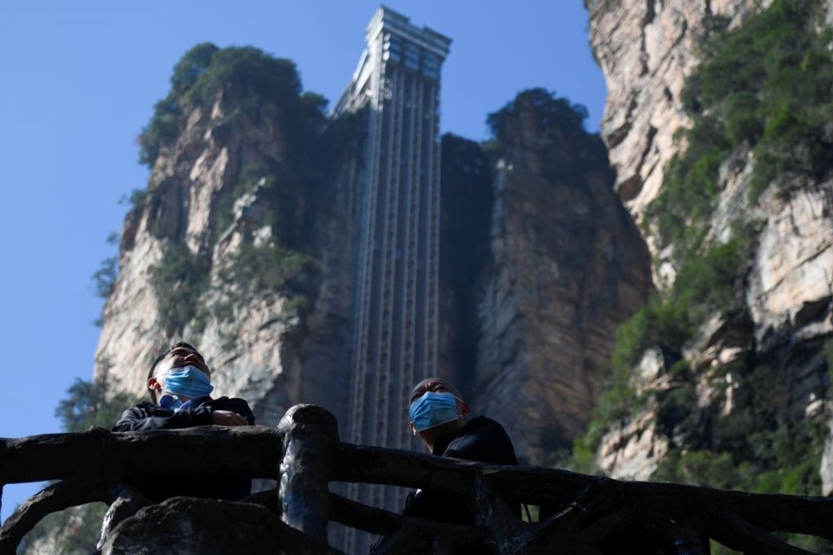 Towering outdoor lift zips tourists up China's 'Avatar' cliff