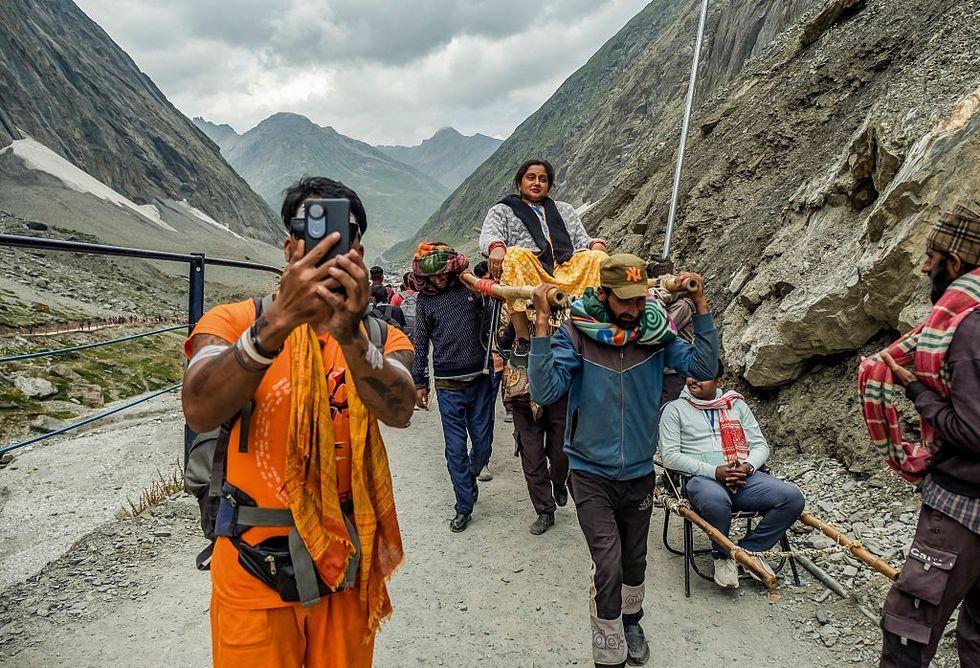 Pilgrims gather at the Baltal Base Camp near Domel