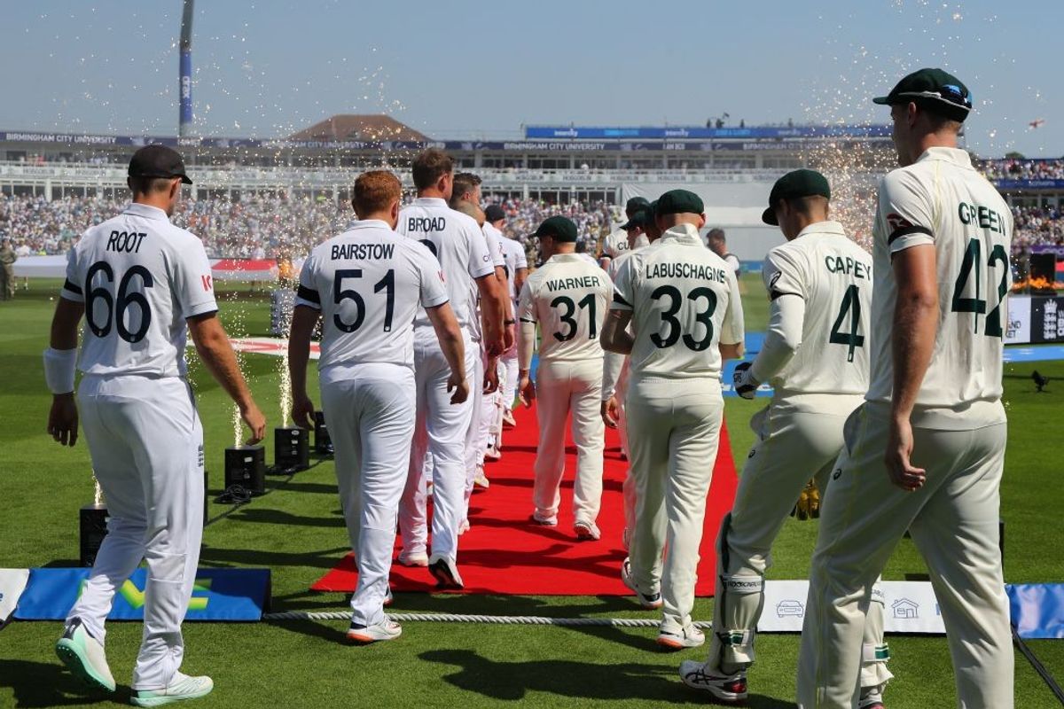 Players walk out onto the field ahead of play on the opening day of the first Ashes cricket Test match between England and Australia at Edgbaston in Birmingham