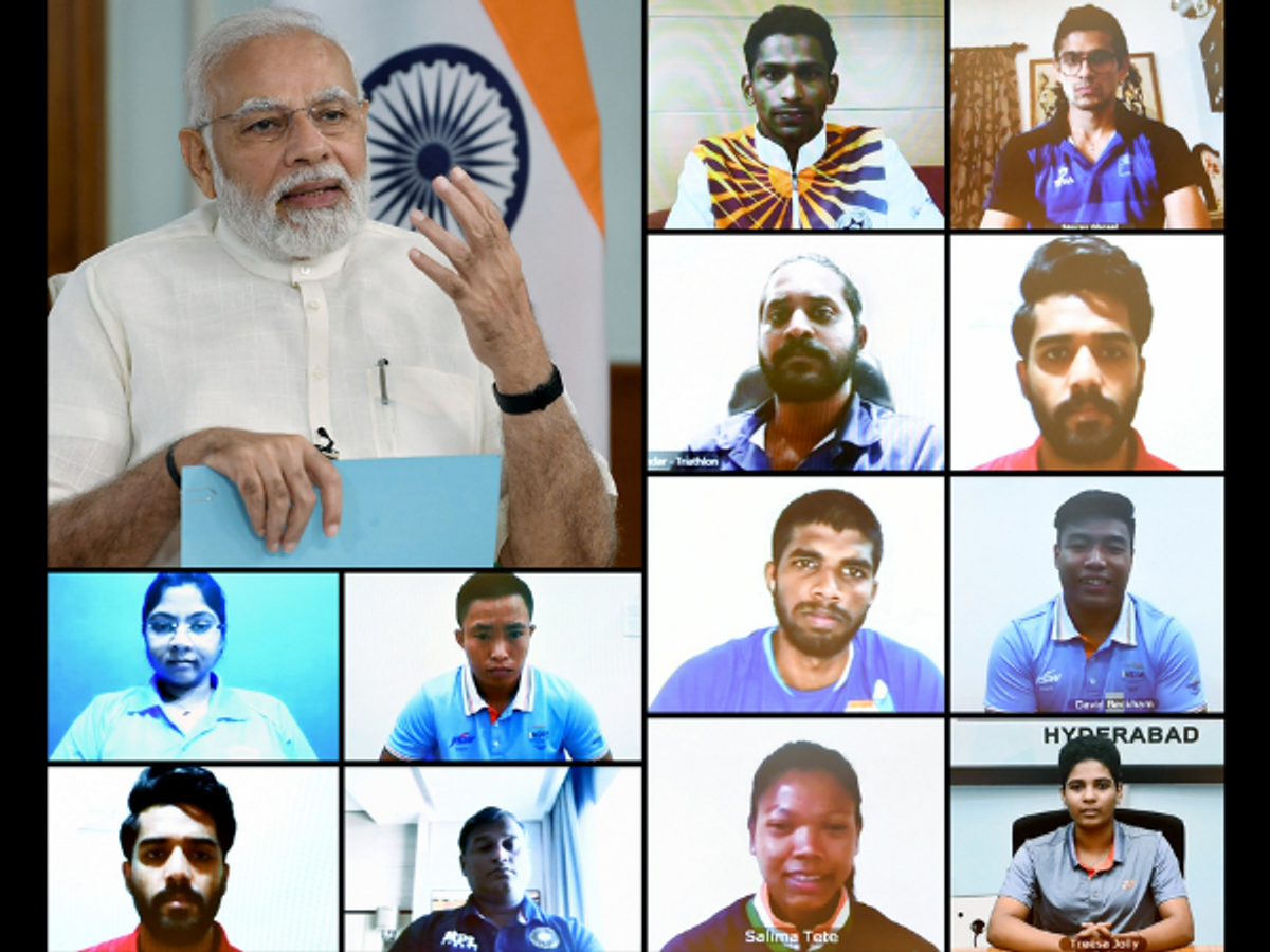 PM Narendra Modi speaks with CWG-bound India athletes