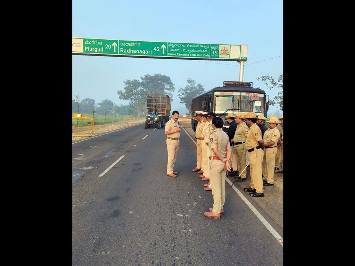 Police officers patrol Karnataka-Maharashtra border at Chikodi, in Belagavi, Karnataka