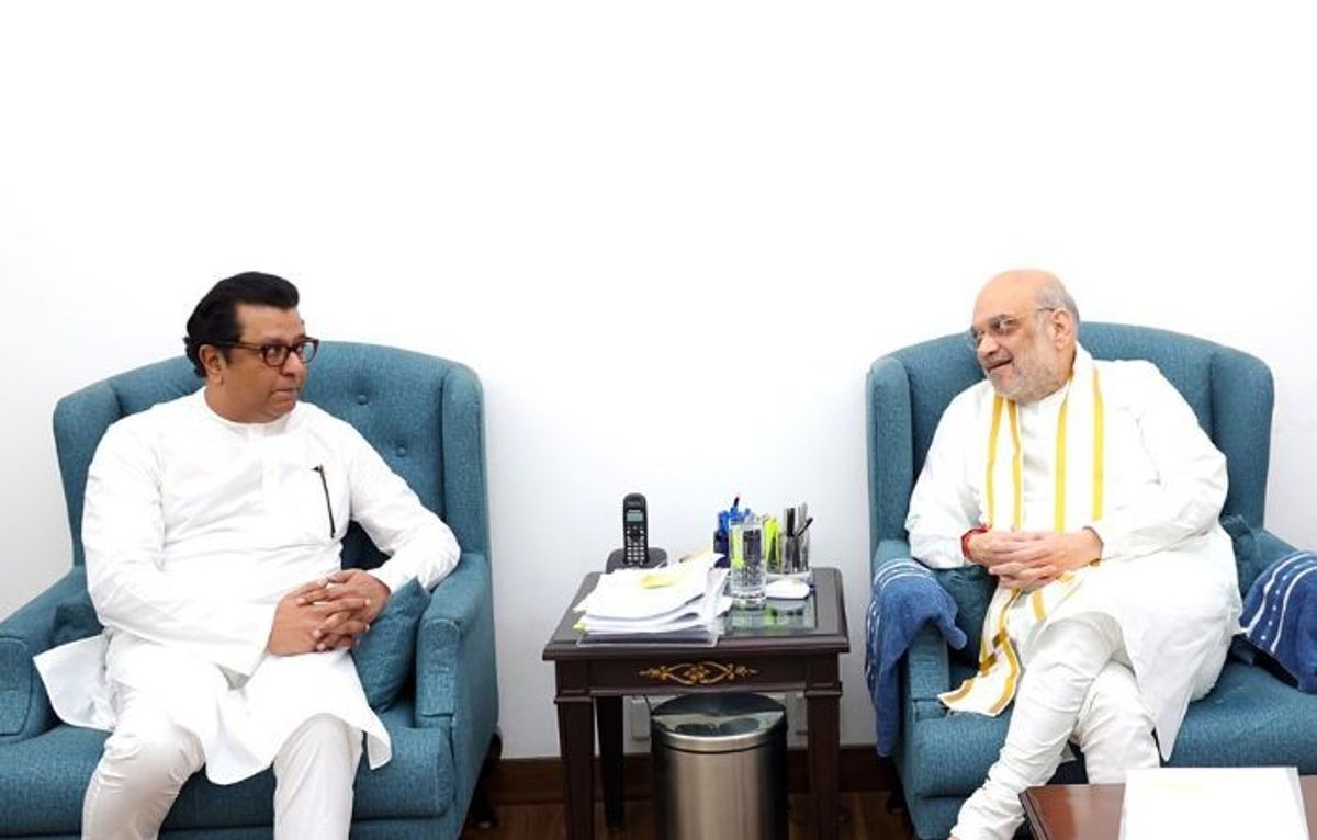 Raj Thackeray (L), chief of Maharashtra Navnirman Sena with Indian home minister Amit Shah, in New Delhi