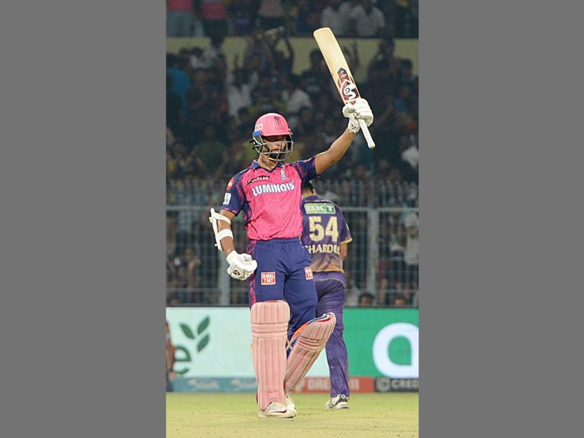 Rajasthan Royals' Yashasvi Jaiswal raises his bat after hitting the fastest fifty of Indian Premier League against Kolkata Knight Riders during IPL 2023, at Eden Gardens, in Kolkata