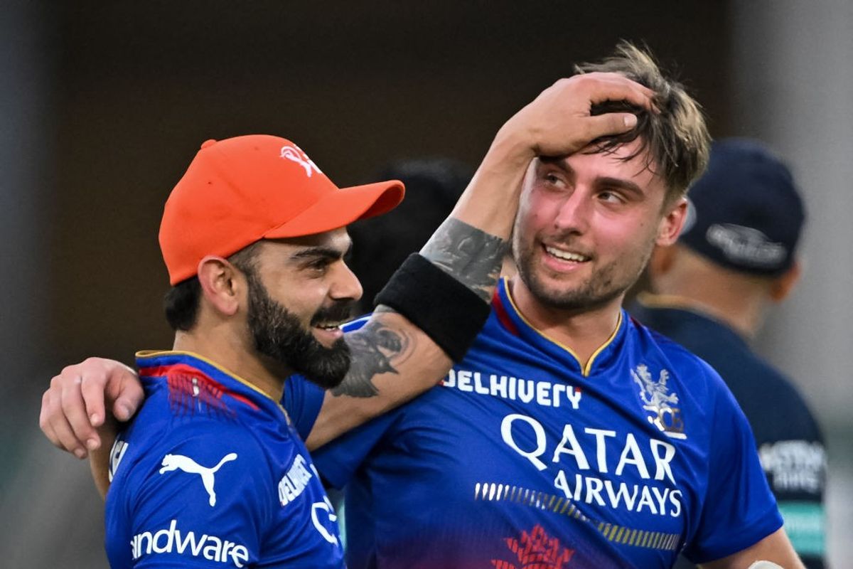 RCB's Virat Kohli and Will Jacks celebrate their 9-wicket win over Gujarat Titans in IPL 2024