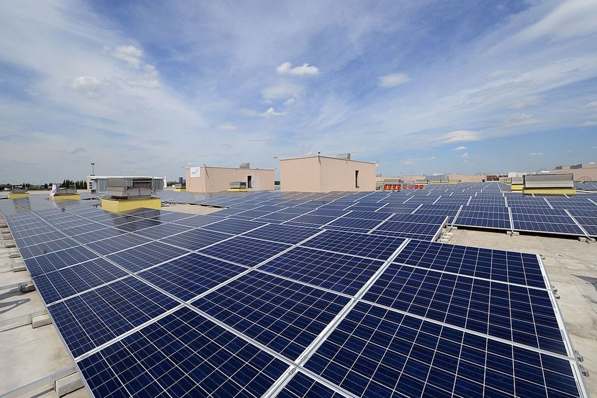 Reliance secures solar deals, shares rise to record high
