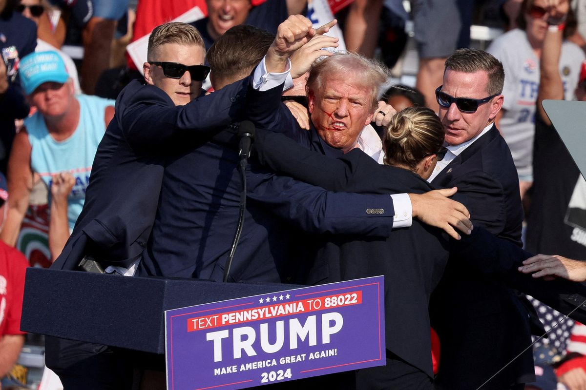 Trump survives assassination attempt