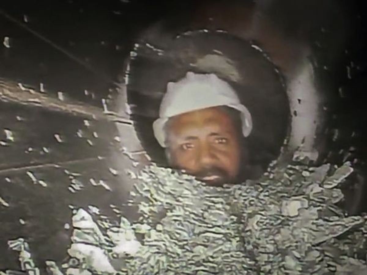 Rescue officials establish audio-visual contact with the workers trapped in the Silkyara tunnel for the first time through the pipeline and endoscopic flexi camera, in Uttarkashi in India's Uttarakhand state