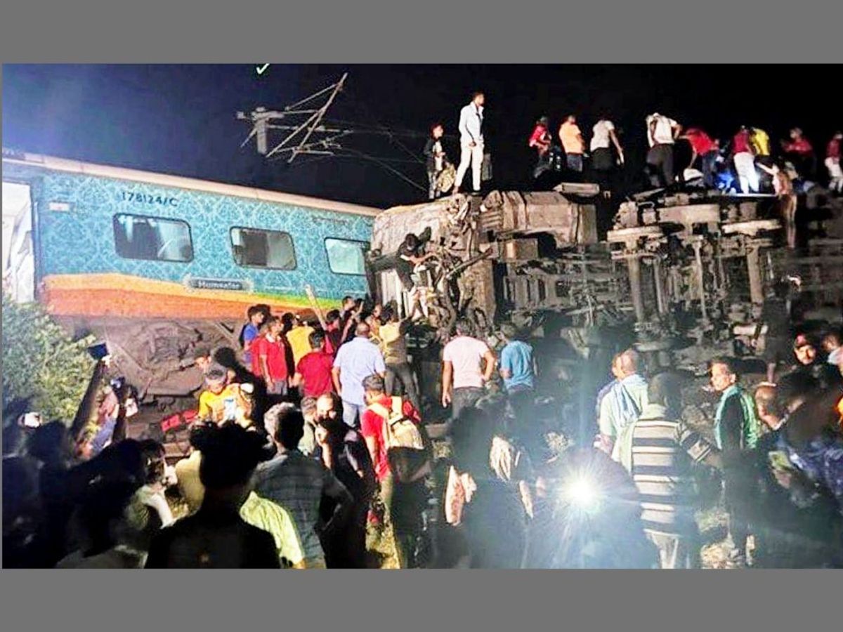 Rescue operation on to bring out survivors from mangled train coaches following a massive crash near Balasore in the eastern Indian state of Odisha