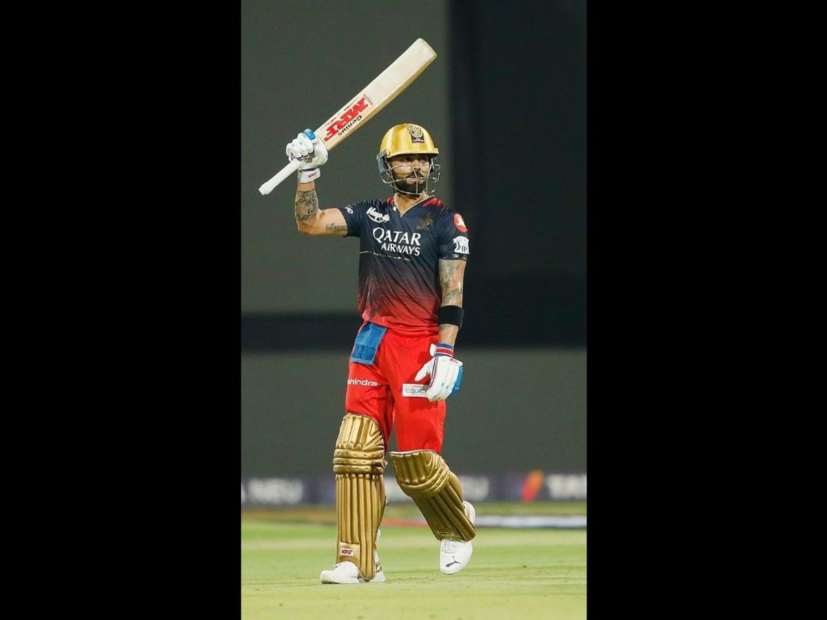 Royal Challengers Bangalore's Virat Kohli celebrates his half-century during a match against Mumbai Indians during the Indian Premier League (IPL) 2023, at M Chinnaswamy Stadium