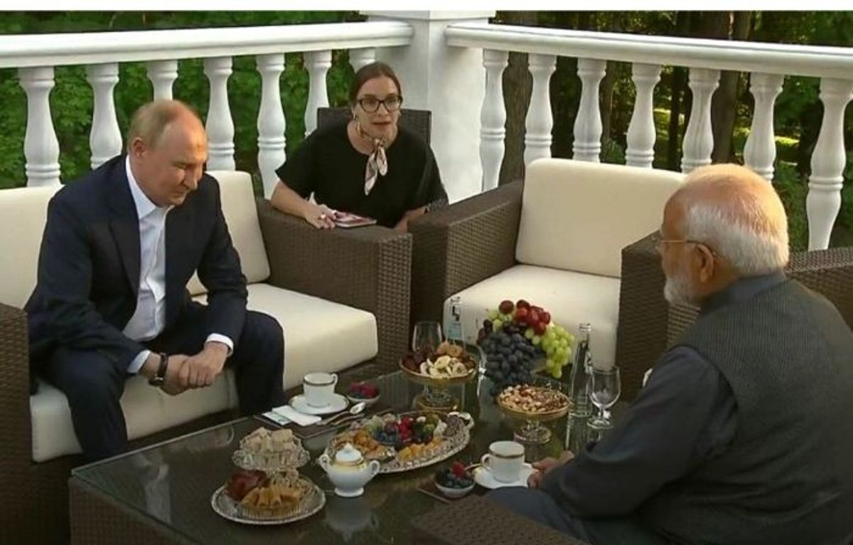 Russian president Vladimir Putin interacts with Indian PM Narendra Modi (R) at his official residence at Novo-Ogaryovo for a private engagement, in Moscow, Russia, on July 8, 2024.