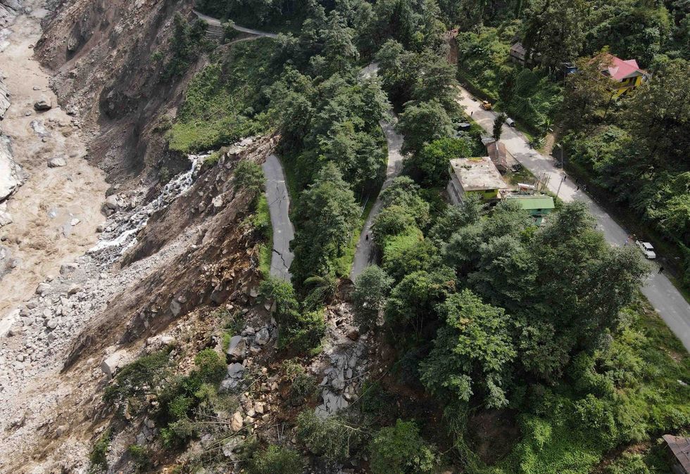 Sikkim floods damaged road scaled