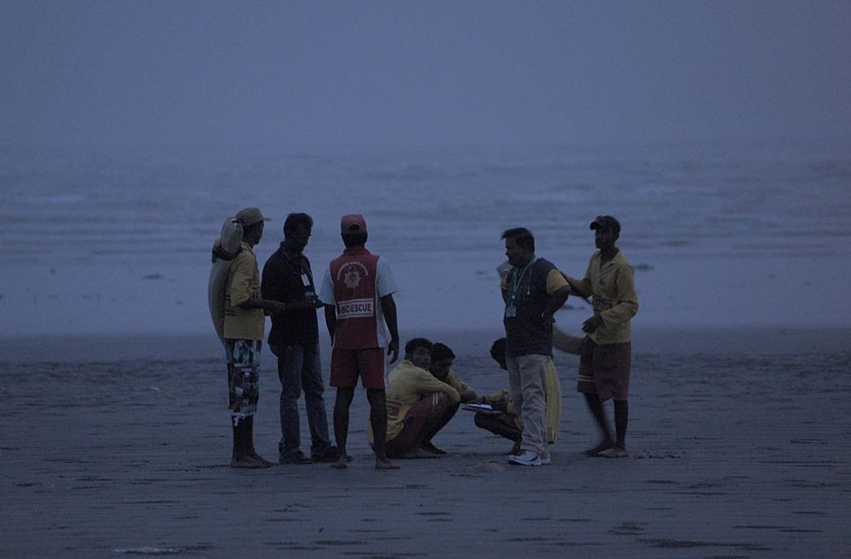 Some people on the Karachi beach in Sindh province of Pakistan