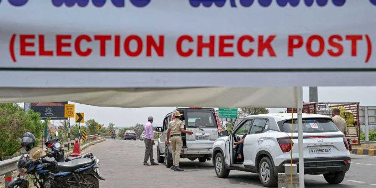 Karnataka elections: Wife leads campaign for candidate husband barred ...