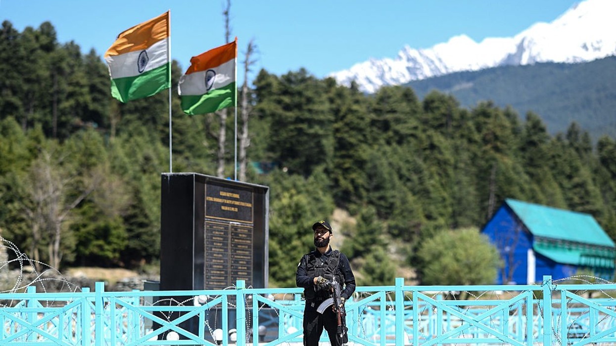 Special Operations Group (SOG) personnel stands guard