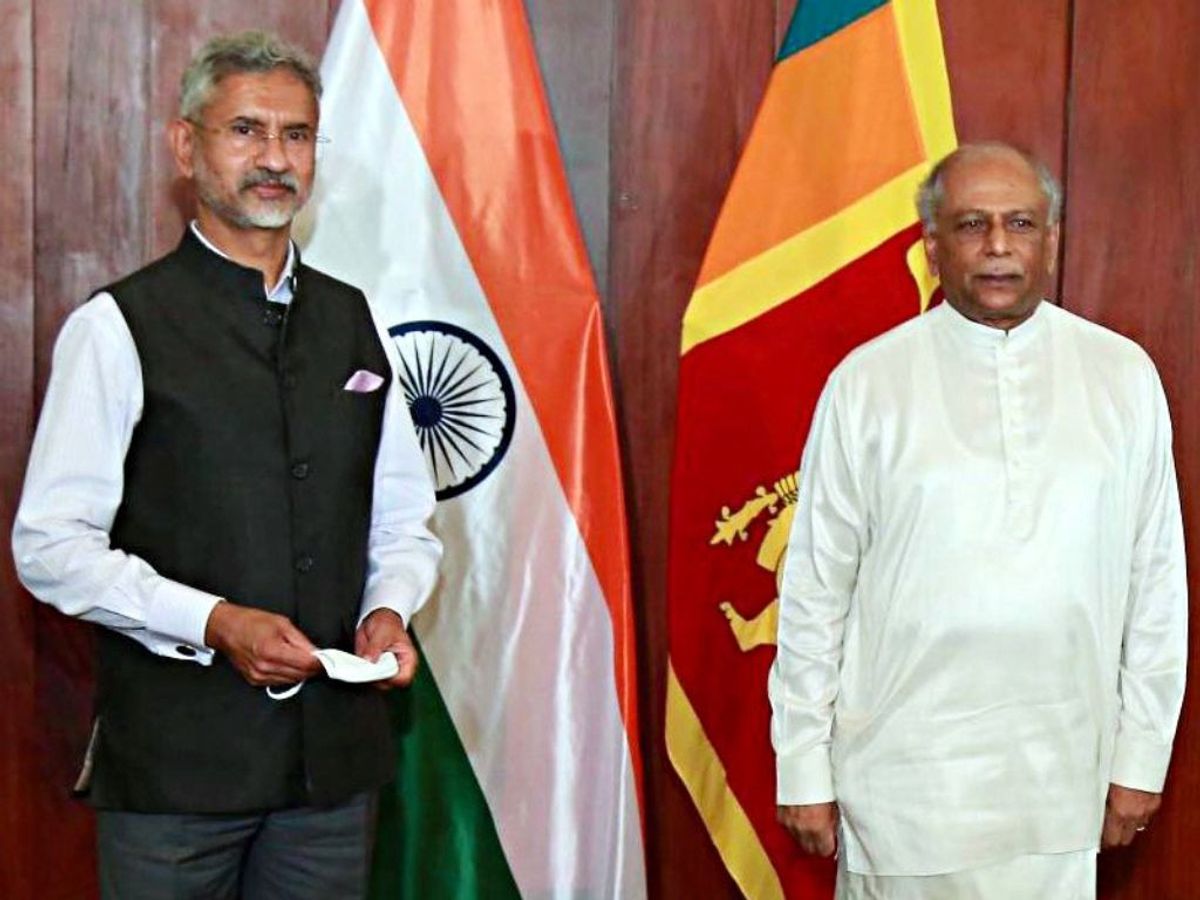 Sri Lankan prime minister Dinesh Gunawardena (R) with India's external affairs minister Jaishankar Subrahmanyam