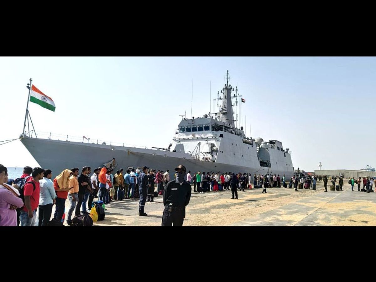Stranded Indians in violence-hit Sudan wait for their turn to board Indian Navy's patrol ship NS Sumedha