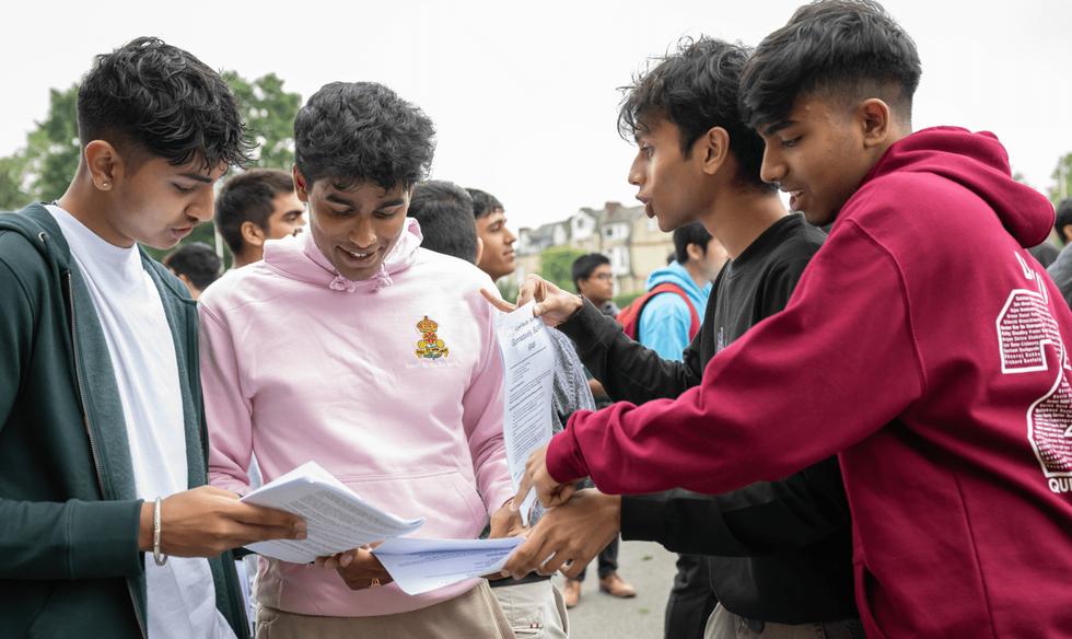 Students discussing their results