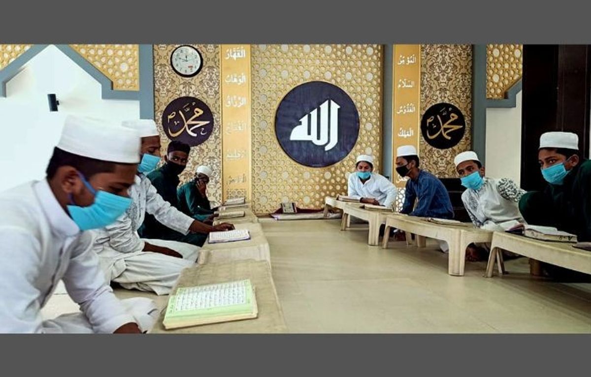 Students study at a madrasa in the northern Indian state of Uttar Pradesh