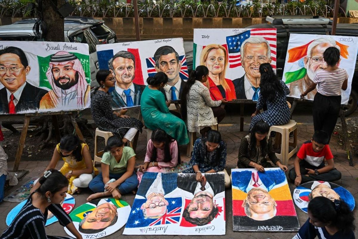 Students work on paintings of world leaders at an art school in Mumbai, India, on September 5, 2023, ahead of the two-day G20 summit in New Delhi