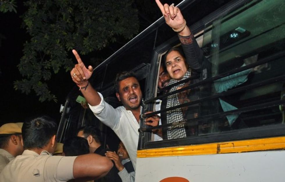 Supporters of Delhi chief minister Arvind Kejriwal protest against his arrest