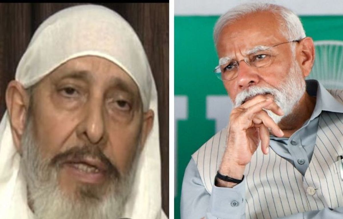 Swami Paul Ji Maharaj (L) and Indian prime minister Narendra Modi
