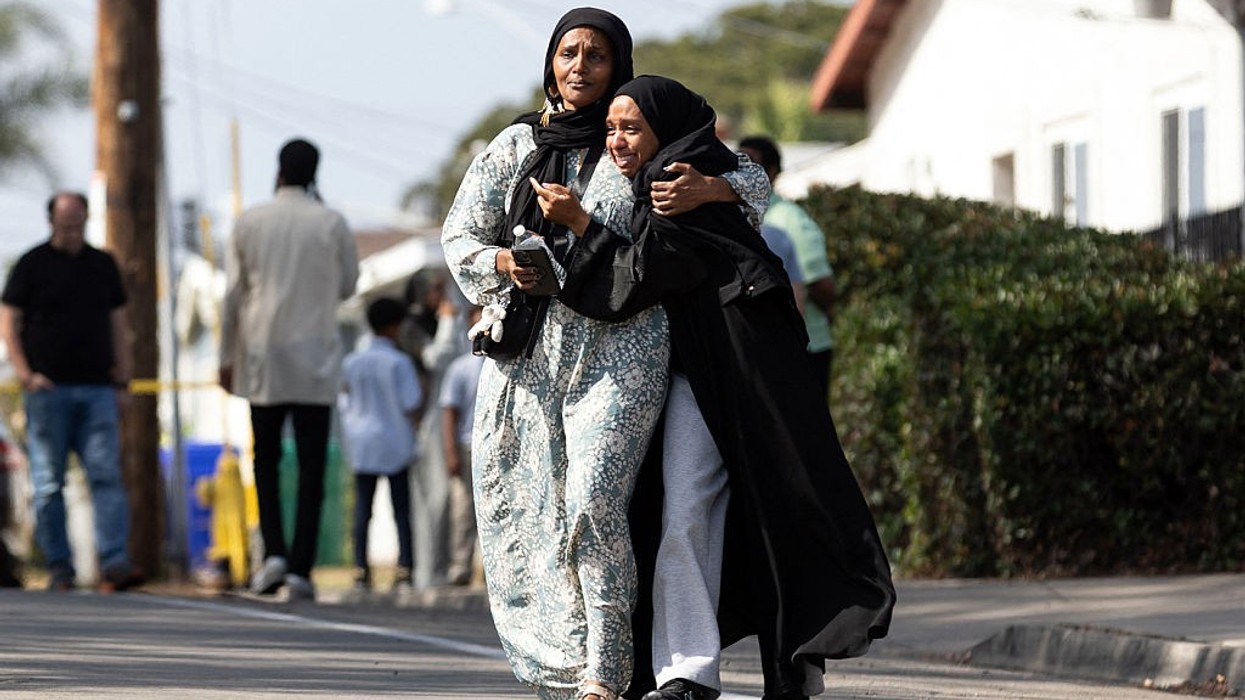 Two teenagers linked to Nazi symbols kill three in California mosque shooting before taking their own lives