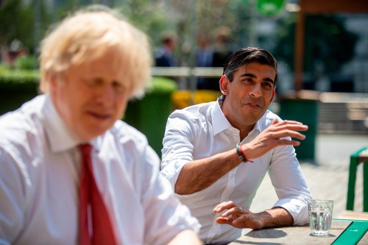 UK PM Rishi Sunak and his predecessor Boris Johnson