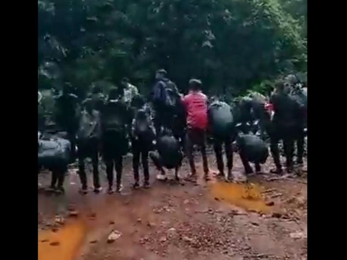 Visitors made to do sit ups along the railway tracks of the South Western Railway line to reach Dudhsagar Fall in the Indian state of Goa. (
