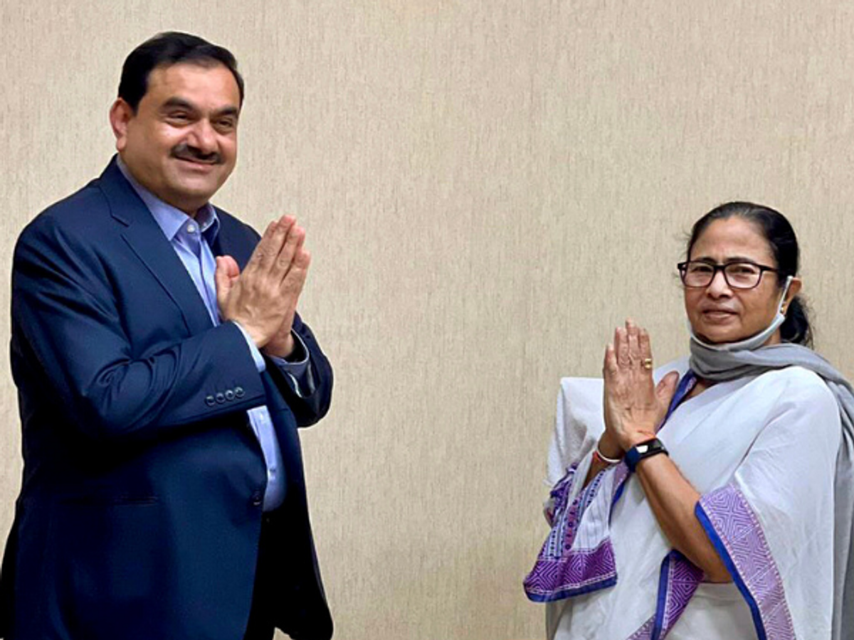 West Bengal chief minister Mamata Banerjee with Adani Group chairman Gautam Adani
