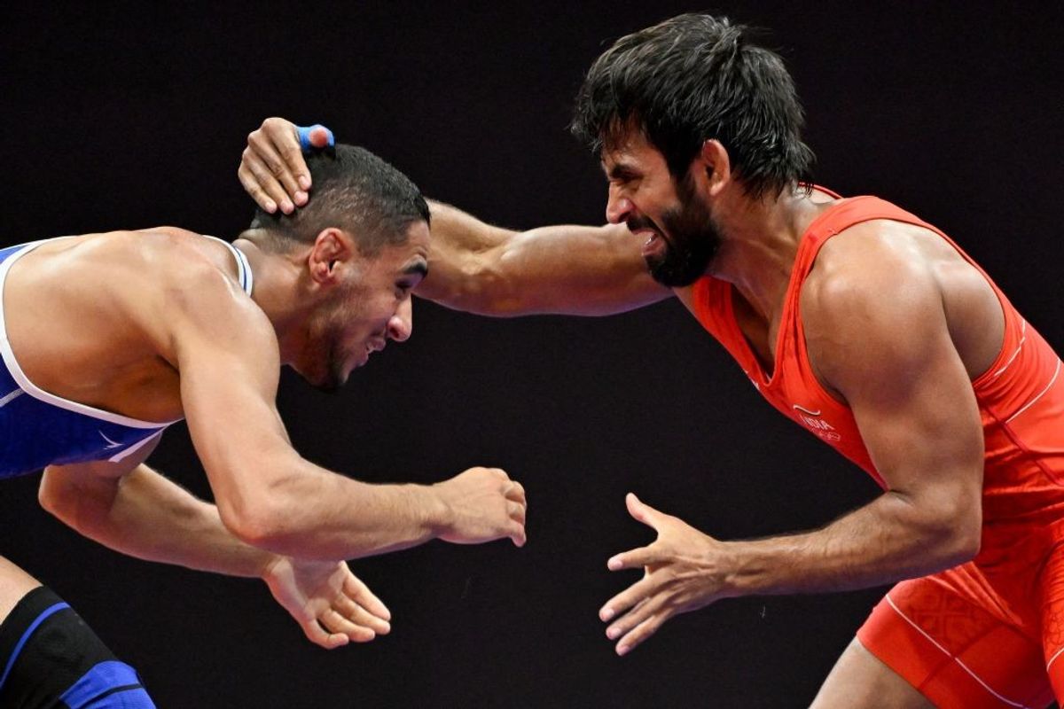 Wrestlers in action