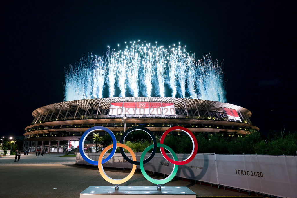 In pictures: Tokyo Olympics kick off but without customary glitz