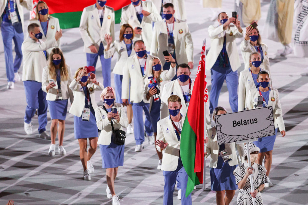 In pictures: Tokyo Olympics kick off but without customary glitz