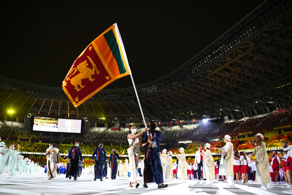 In pictures: Tokyo Olympics kick off but without customary glitz