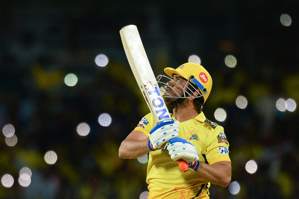 MSD: M.S. Dhoni in Chennai Super Kings Jersey with holding Ton Cricket Bat and Helmet
