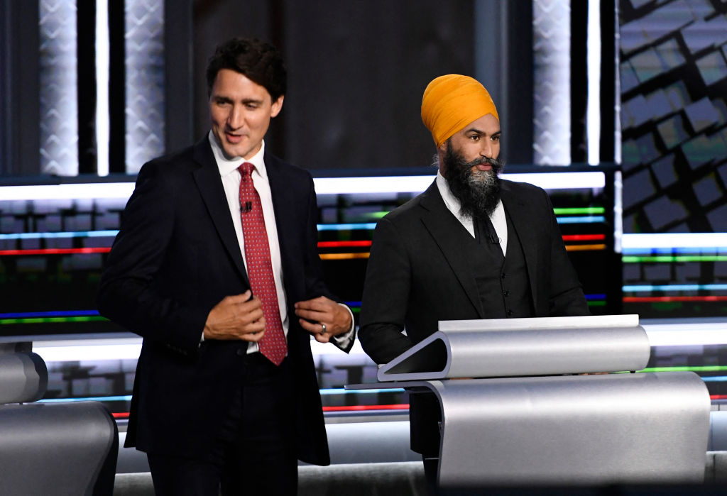 Canadian prime minister and Liberal leader Justin Trudeau (L) with New Democratic Party leader Jagmeet Singh