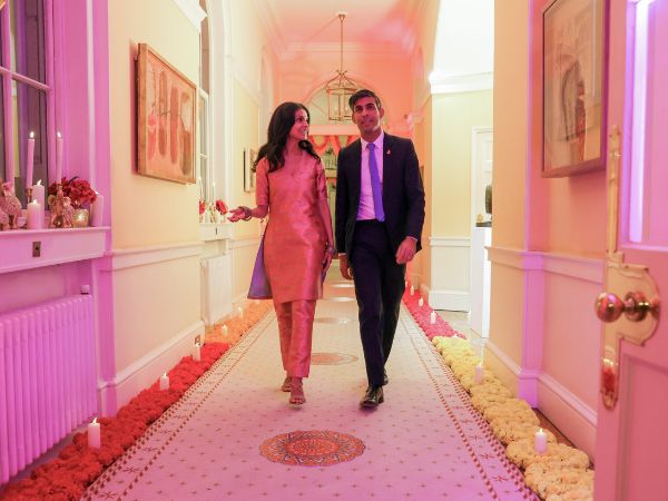 British prime minister Rishi Sunak and his wife Akshata Murty on their way to welcome guests from the Hindu community ahead of the Diwali festival, at Downing Street