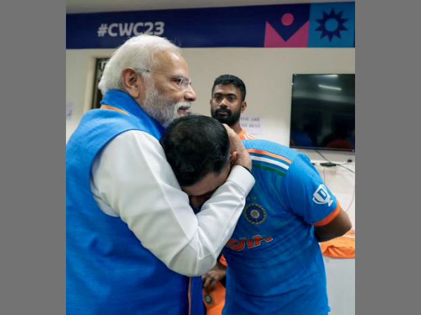 Indian PM Narendra Modi consoles India cricketer Mohammed Shami after the team lost to Australia in the final of World Cup 2023