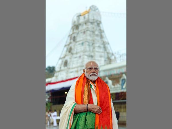 Prime Minister Narendra Modi leaves after offering prayers at the Venkateswara Swamy Temple at Tirumala, 