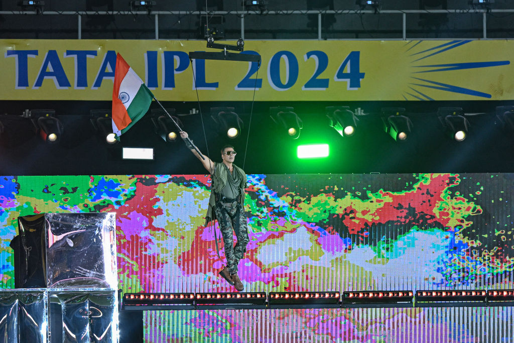 Indian actor Akshay Kumar performs at the opening ceremony of IPL 2024